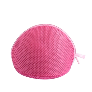 Detail of pink sandwich mesh laundry bag for bras showing high-quality zipper and texture