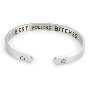Detailed view of silver stainless steel cuff bracelet with Best Fucking Bitches engraving