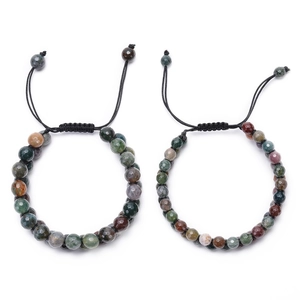Detail of faceted Indian agate stone beads and hand-woven adjustable cord on bracelets