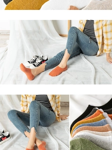 Detail showing various candy-colored low cut invisible socks with non-slip silicone grip