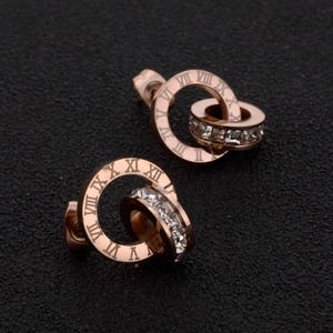 Boucles d'oreilles or rose avec chiffres romains et cristaux brillants pour femmes