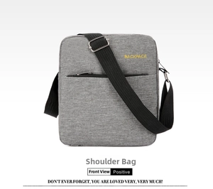 Close-up of gray Oxford fabric messenger bag with BACKPACK text and metal buckle detail