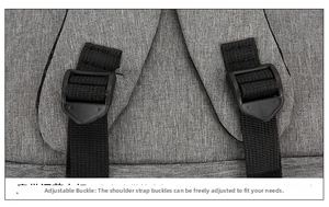 Close-up of adjustable shoulder strap buckle on waterproof Oxford business backpack