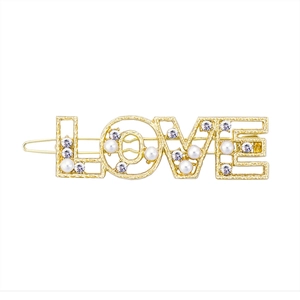 Golden alloy LOVE hair clip with embedded white pearls and sparkling rhinestones