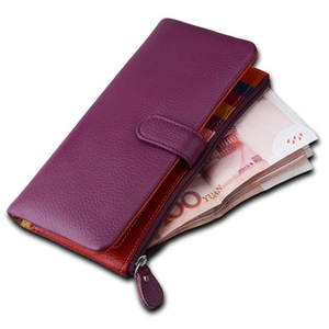 Purple pebble grain leather wallet featuring multiple card slots and orange contrast lining