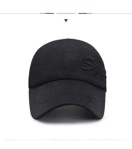 Close-up of black mesh baseball cap showing breathable knit texture and sport embroidery