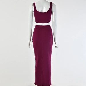 Back view of burgundy sleeveless crop top and maxi skirt set in ribbed knit fabric