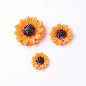 Three sizes of yellow resin sunflower charms with a 1.5mm hole for DIY jewelry making