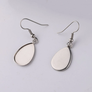 Front and back view of silver teardrop stainless steel earring hooks for DIY jewelry