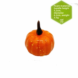 Detailed view of 5cm orange foam pumpkin prop with dimensions 5.2cm height and 4.2cm diameter