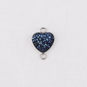 Detail of 13mm blue heart connector with sparkling stone effect for jewelry making