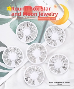 Close-up of 6 boxes containing silver star and moon nail art alloy metal studs