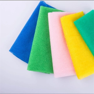 Set of four colorful long nylon exfoliating back scrubbers in blue green pink and yellow