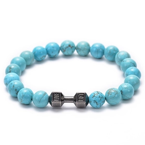 Detail of turquoise beaded bracelet featuring a grey dumbbell charm with LIVE LIFT engraving