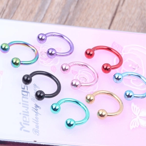Classic stainless steel circular barbell piercing rings in eight vibrant metallic colors