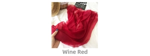 Detailed texture of wine red semi-transparent chiffon shawl with delicate edge finish