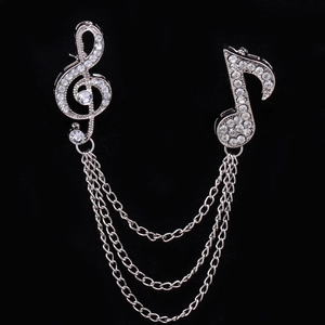Sparkling treble clef and note brooch pin with silver chain and rhinestones