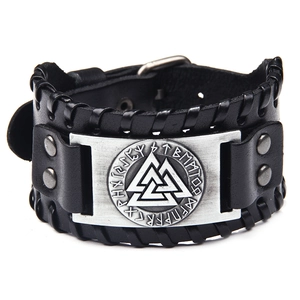 Nordic Viking leather bracelet with silver Valknut symbol and Futhark runes on white background