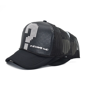 Detail of black mesh trucker hat with pixelated question mark and white slogan print