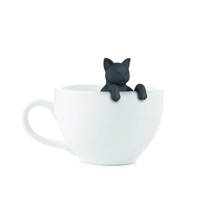 Black cat silicone tea infuser hanging on white ceramic cup edge for loose leaf tea
