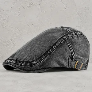 Breathable washed denim flat cap in dark grey with vintage finish and side metal buckle