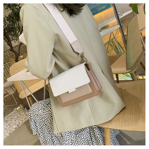 Modern rectangular flap crossbody bag in chic color-block design with wide fabric strap