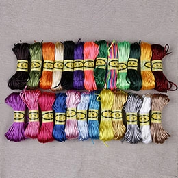 Detailed display of 24 colorful elastic nylon cords for DIY jewelry making and beading