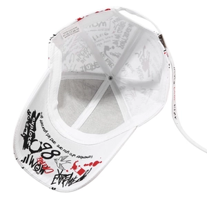 White cotton graffiti baseball cap with adjustable strap and street art pattern
