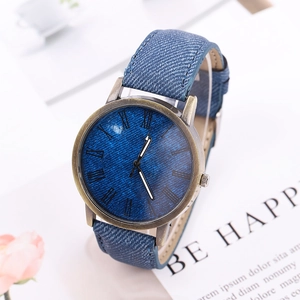 Retro quartz watch with bronze case, blue denim texture dial, and Roman numerals