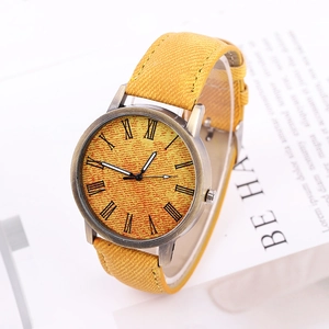 Fashionable Roman numeral watch with yellow textured dial and canvas strap