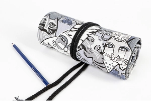 Detail of canvas pencil wrap with cat pattern and black strap for stationery storage
