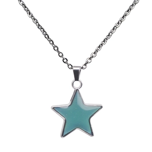 Detailed view of silver star pendant necklace with temperature sensitive color changing inlay