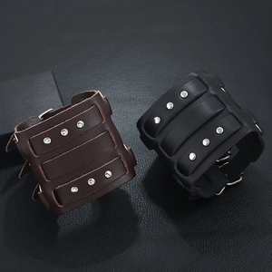 Punk style wide genuine leather bracelets with metal studs in black and dark brown colors