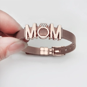 Rose gold mesh bracelet with MOM charm and crystal heart detail for Mother's Day