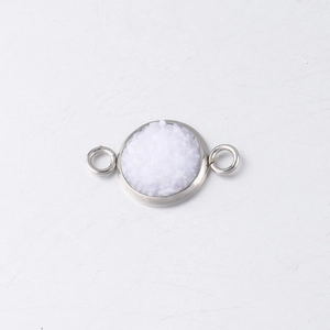 Detailed macro view of 10mm stainless steel drusy connector with white glitter stone inlay