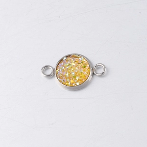 Detail of 10mm stainless steel connector with yellow drusy glitter for DIY jewelry making