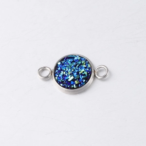 Macro view of 10mm stainless steel drusy connector with glittering blue and green stones