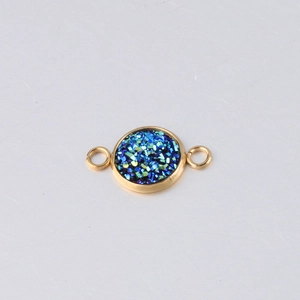 Close-up of 10mm gold stainless steel round charm with blue glitter and dual connectors