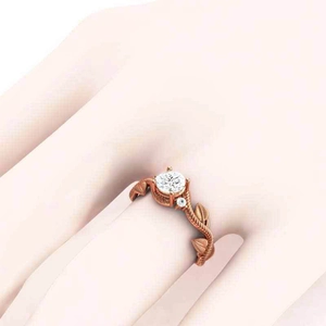 Roségouden ring met bladranken en ronde briljant geslepen zirkonia in natuurstijl