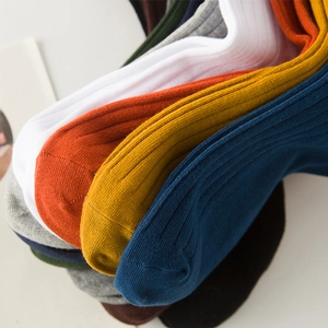 Men's breathable cotton crew socks in multiple solid colors with ribbed texture design