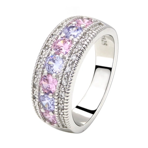 Macro shot of S925 sterling silver band with pink and purple cubic zirconia stones