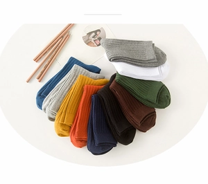 Close-up of ribbed texture and diverse color palette of cotton crew socks for men
