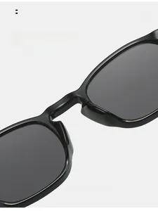 Close-up of integrated smooth nose pads on vintage thick frame black sunglasses