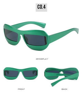 Three-angle view of vibrant green futuristic cat-eye sunglasses with thick curved frames