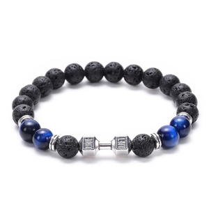 Detailed view of lava stone and tiger eye beads with silver dumbbell LIVE LIFT charm
