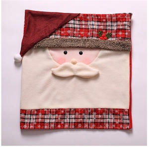 Close-up of Santa Claus chair cover with red plaid pattern and plush beard details