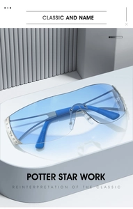 Detail view of Y2K rimless sunglasses with blue lenses and star shaped rhinestone decor