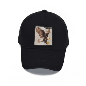 Black cotton mesh trucker hat featuring eagle embroidery and FREEDOM patch