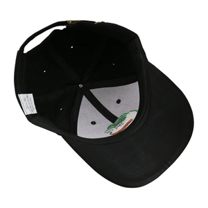 Detail view of cotton baseball cap interior featuring a metallic buckle and wash label