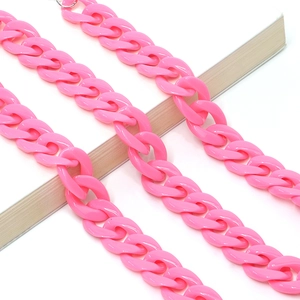 Macro shot of pink acrylic chunky Cuban chain link for glasses or masks accessories